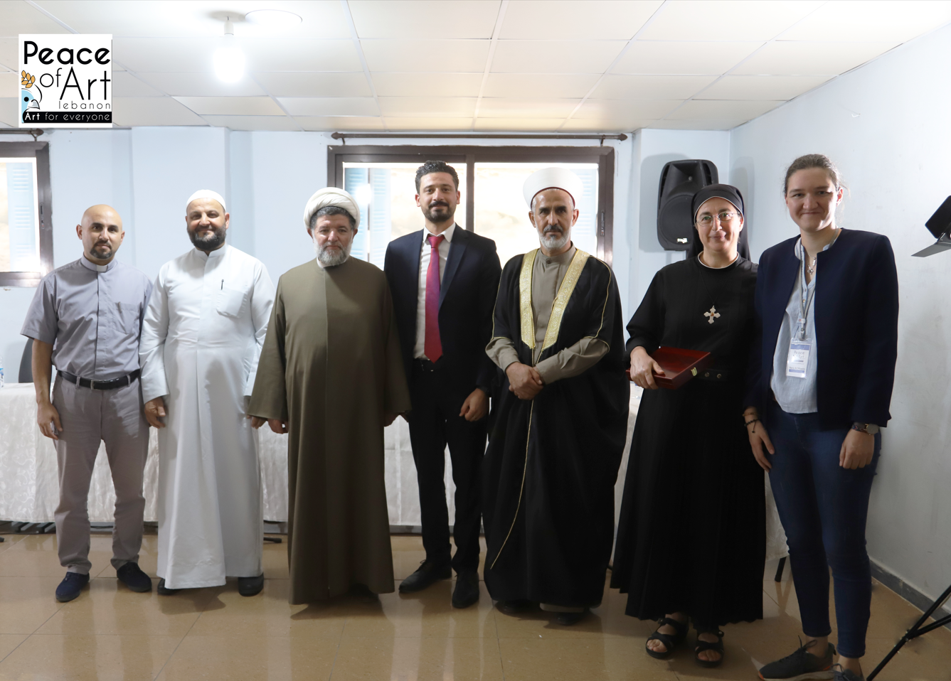 Religious leaders and Peace of Art team at Musawat roundtable