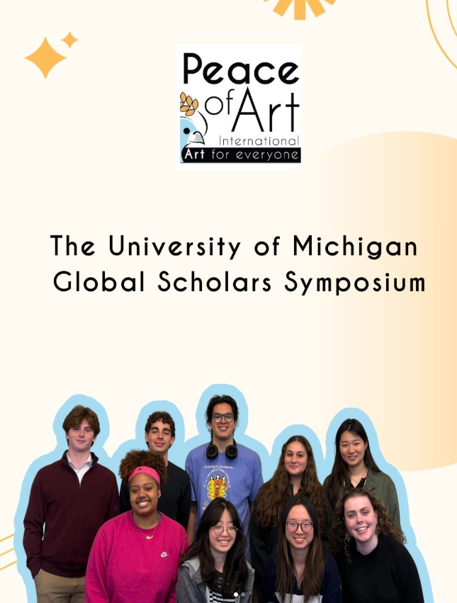 Group of nine diverse students at the University of Michigan Global Scholars Symposium for Peace of Art event.