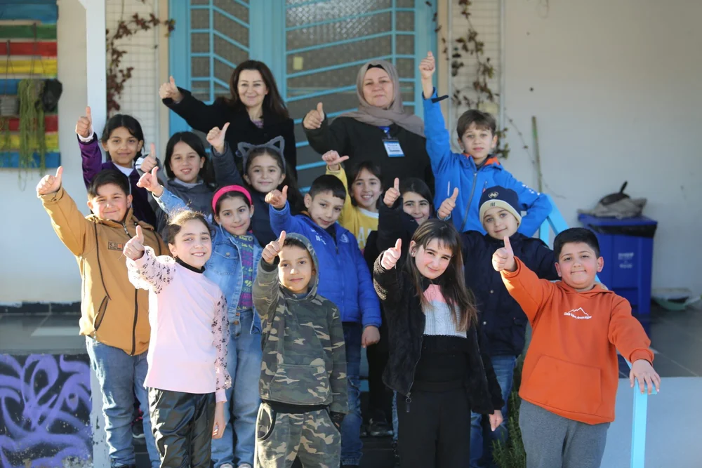 Children participating in a Peace of Art activity