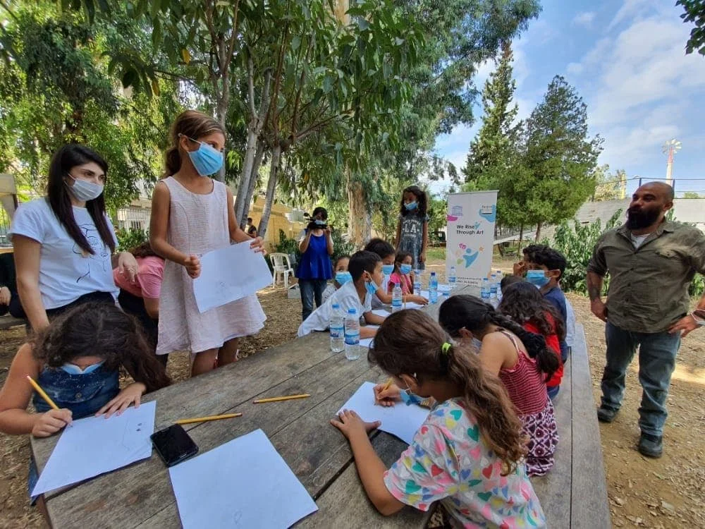 Children participating in Peace of Art's We Rise Through Art activities in 2020