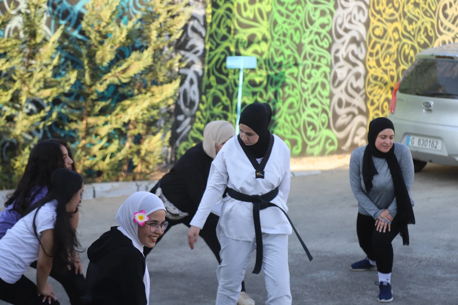Women participating in Peace of Art self defense training