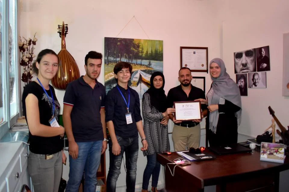 Peace of Art receiving recognition from film festival representatives