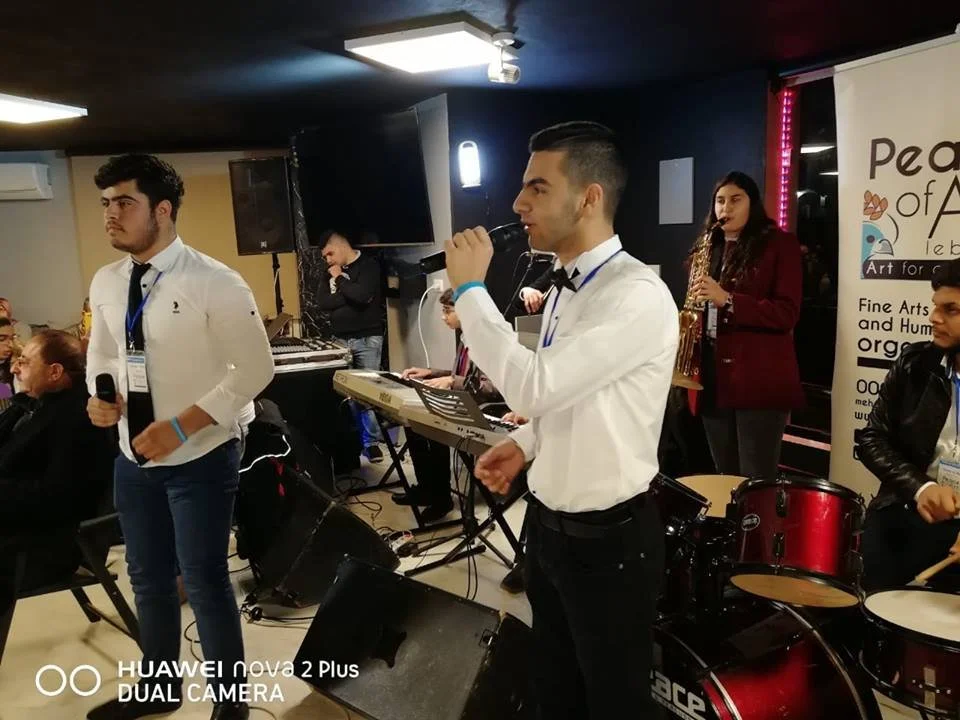 Peace of Art band performing in Al Ain