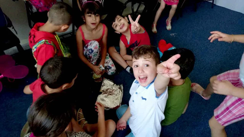 Children participating in creative summer activities
