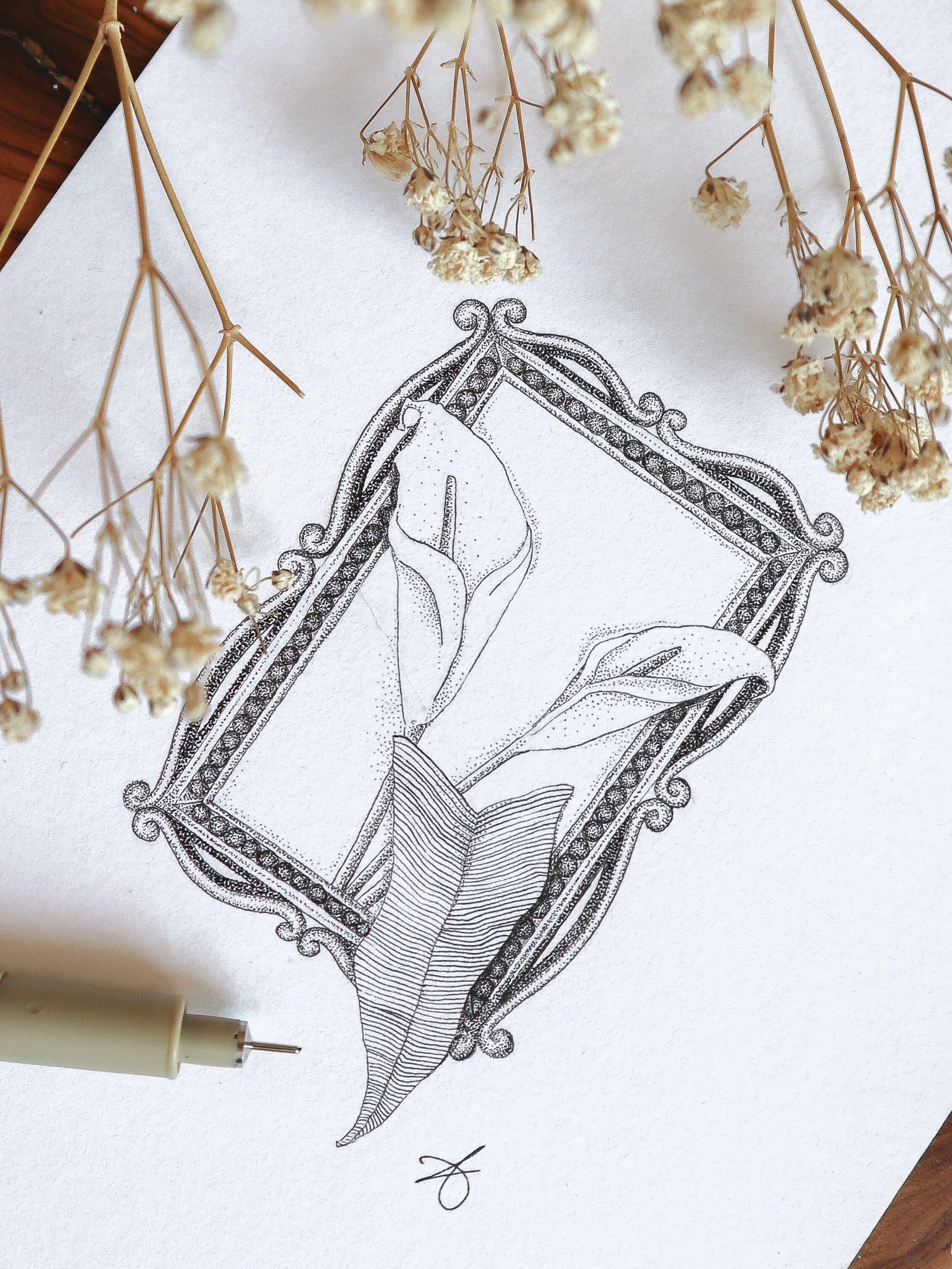 Dessin original en pointillisme représentant deux arums dans un cadre orné