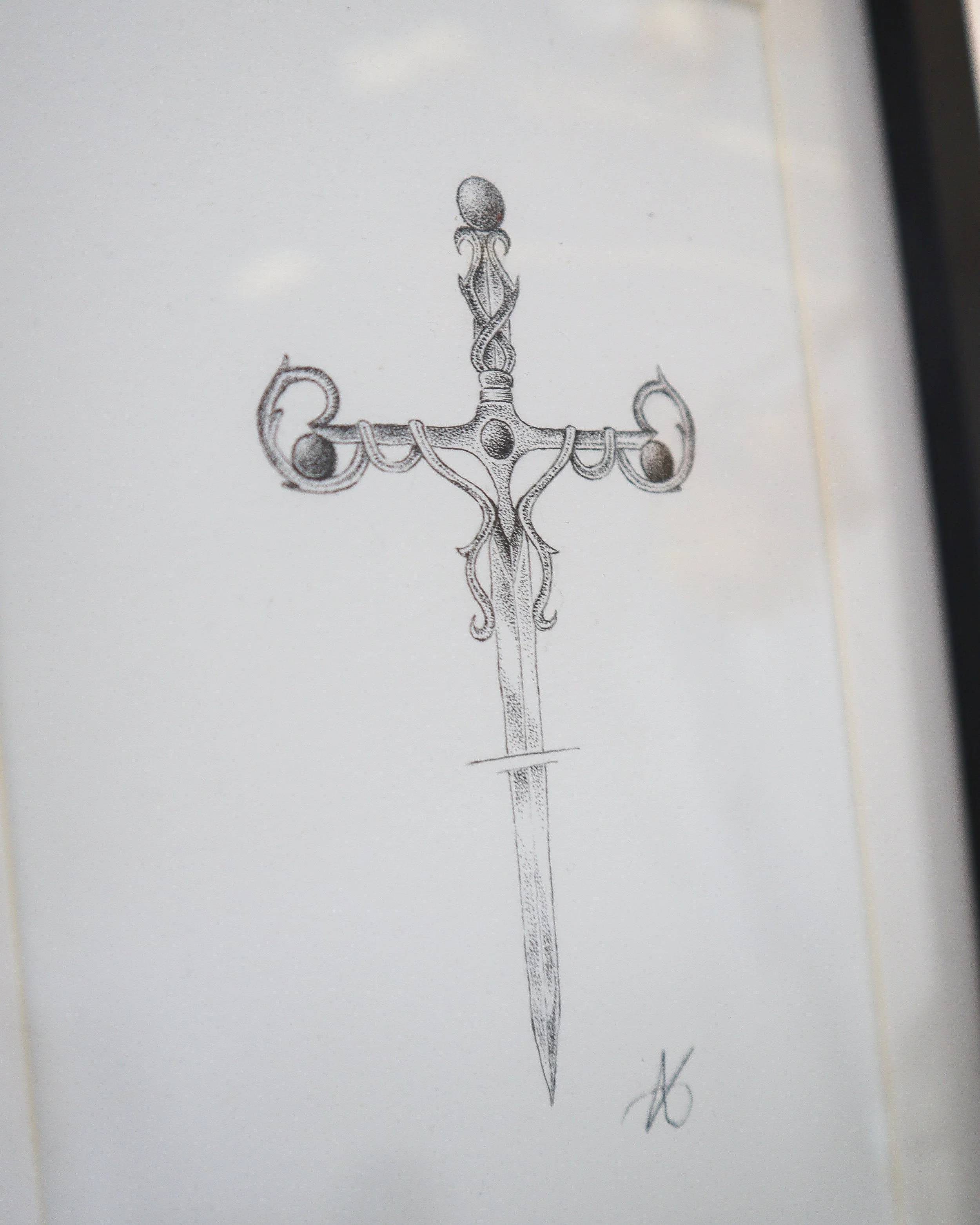 Dessin original en pointillisme représentant une dague ornée