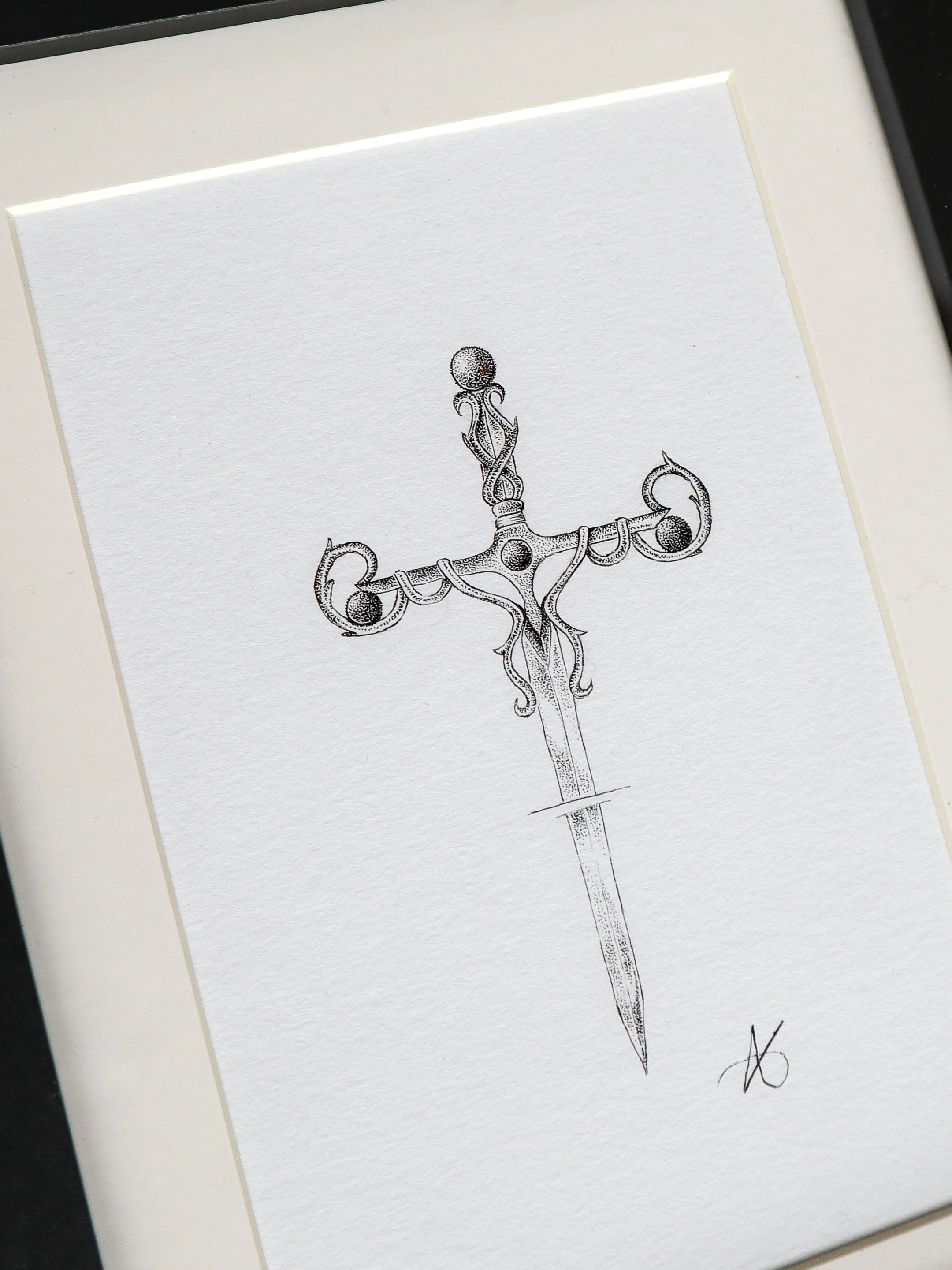 Dessin original en pointillisme représentant une dague ornée