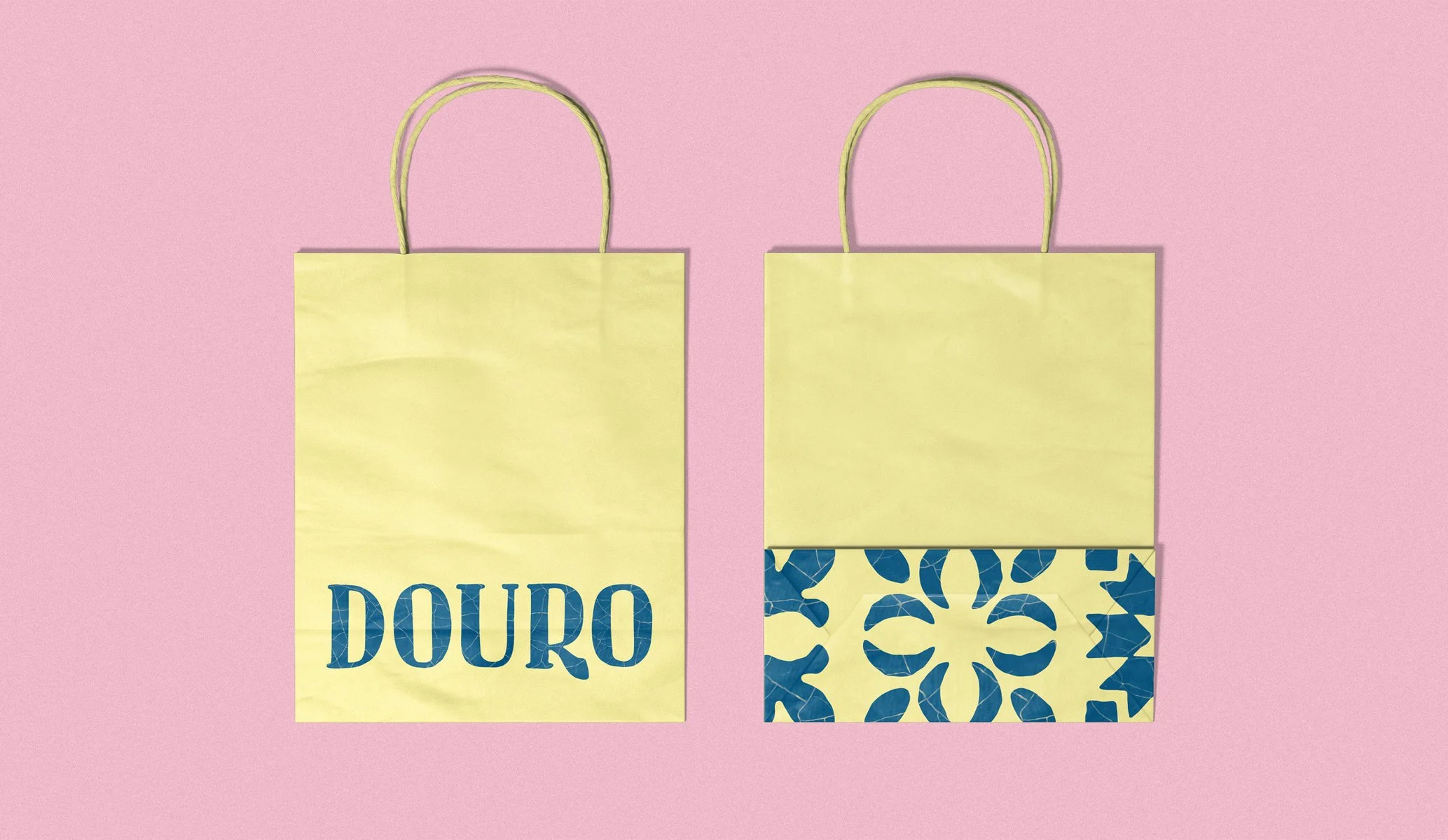 Branded paper bags in brand colours established as part of the brand identity by Colt