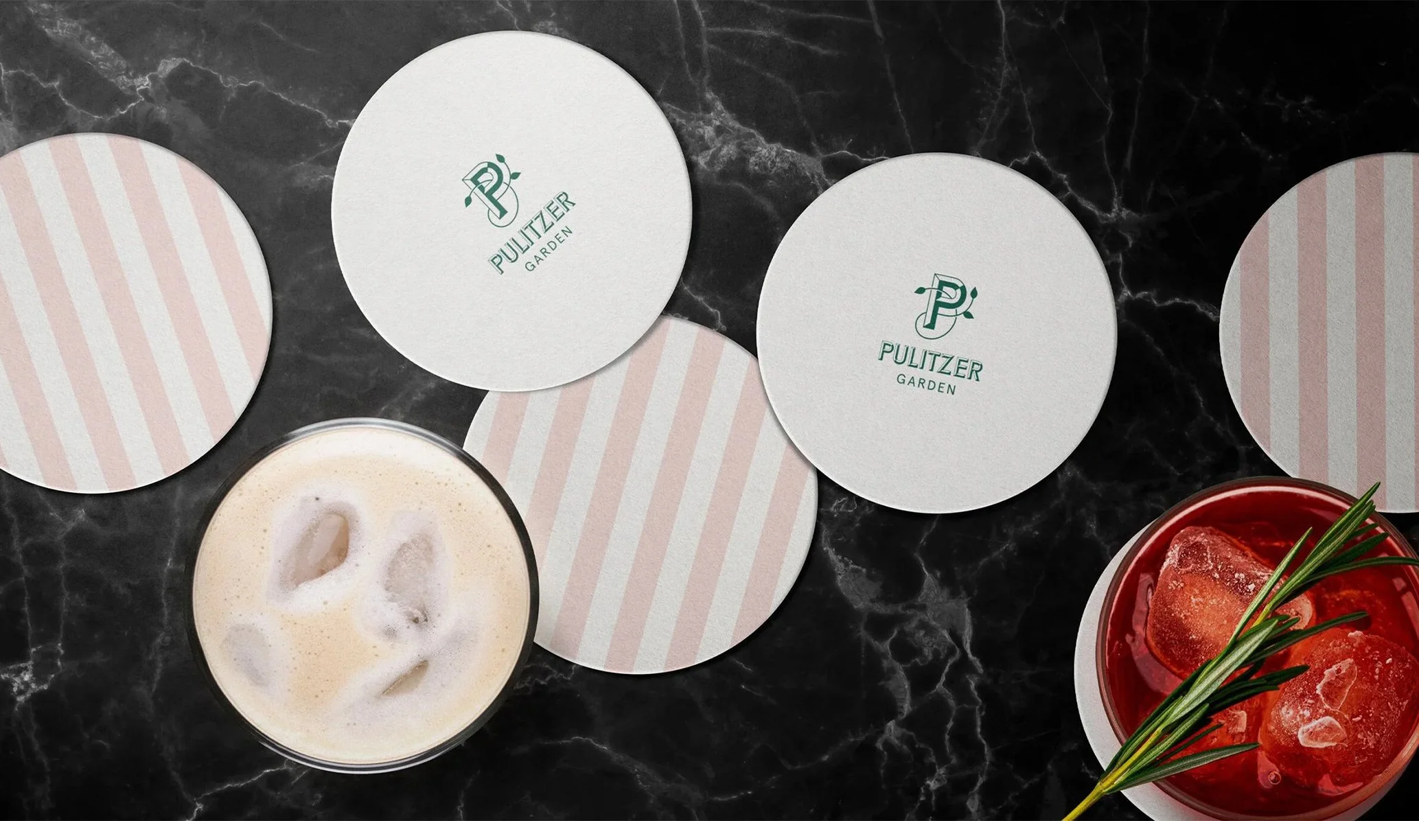 white and striped drinks coasters featuring the logo for Pulitzer Garden restaurant in Amsterdam
