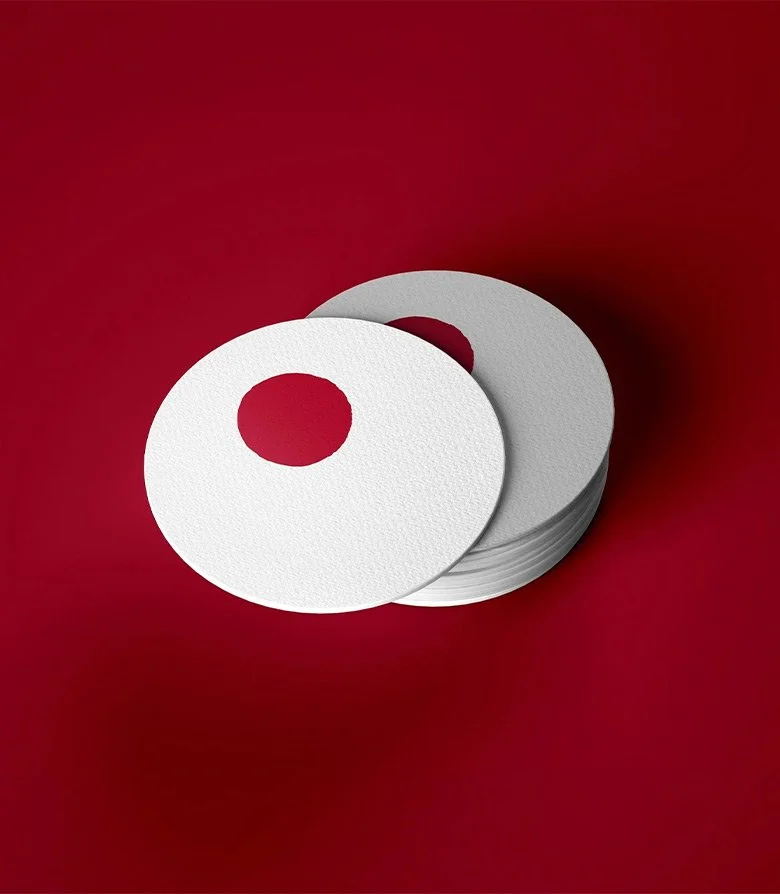 Coasters for One Hundred Shoreditch lobby bar created as part of the suite of collateral when applying the new brand identity by Colt