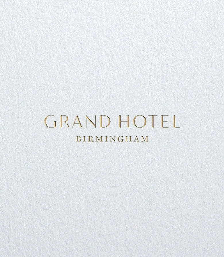 Gold foil blocked wordmark for The Grand, Birmingham, part of the brand identity by Colt