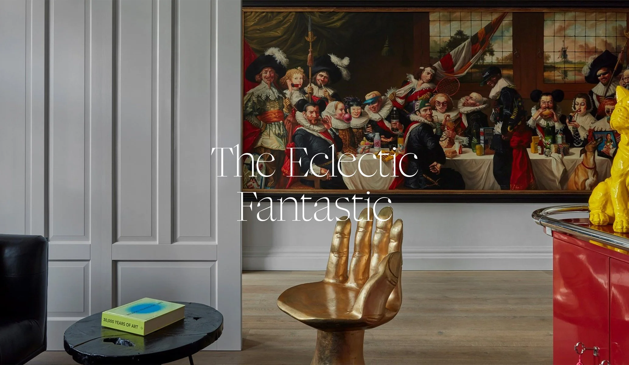 Interior design at Pulitzer Hotel in Amsterdam featuring a gold seat and detailed painting with 'The Eclectic Fantastic' centrally