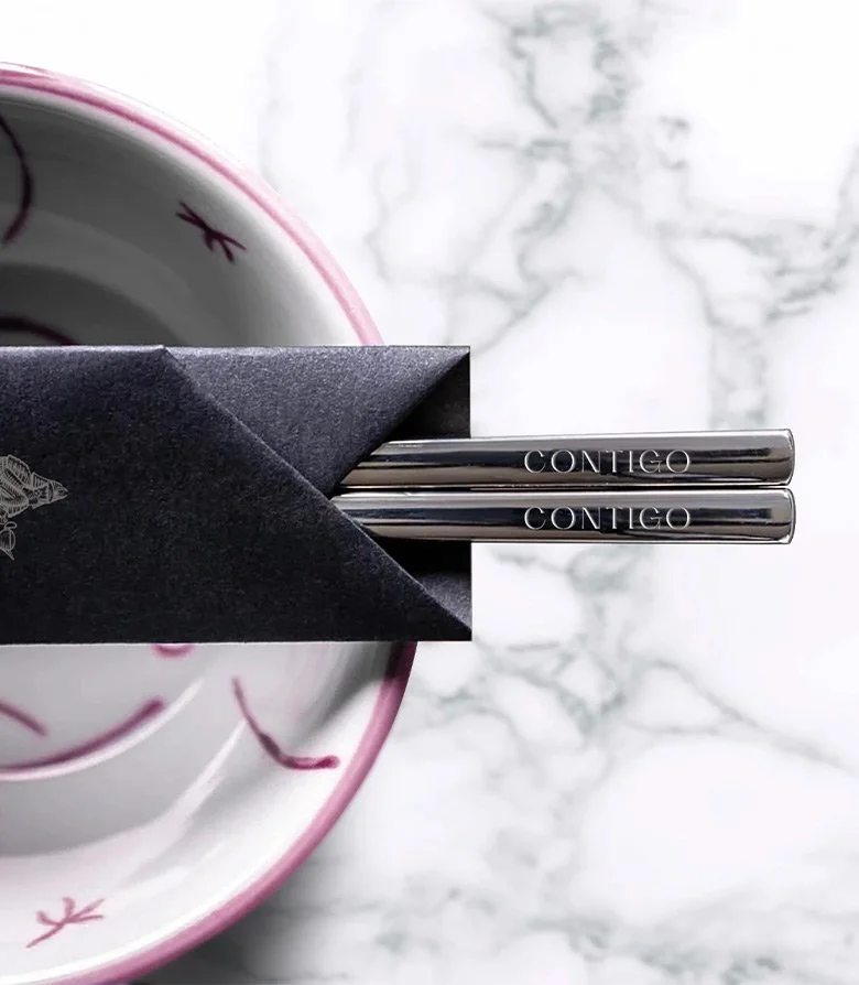 Branded chop sticks created by Colt as part of the brand identity for Contigo restaurant in London