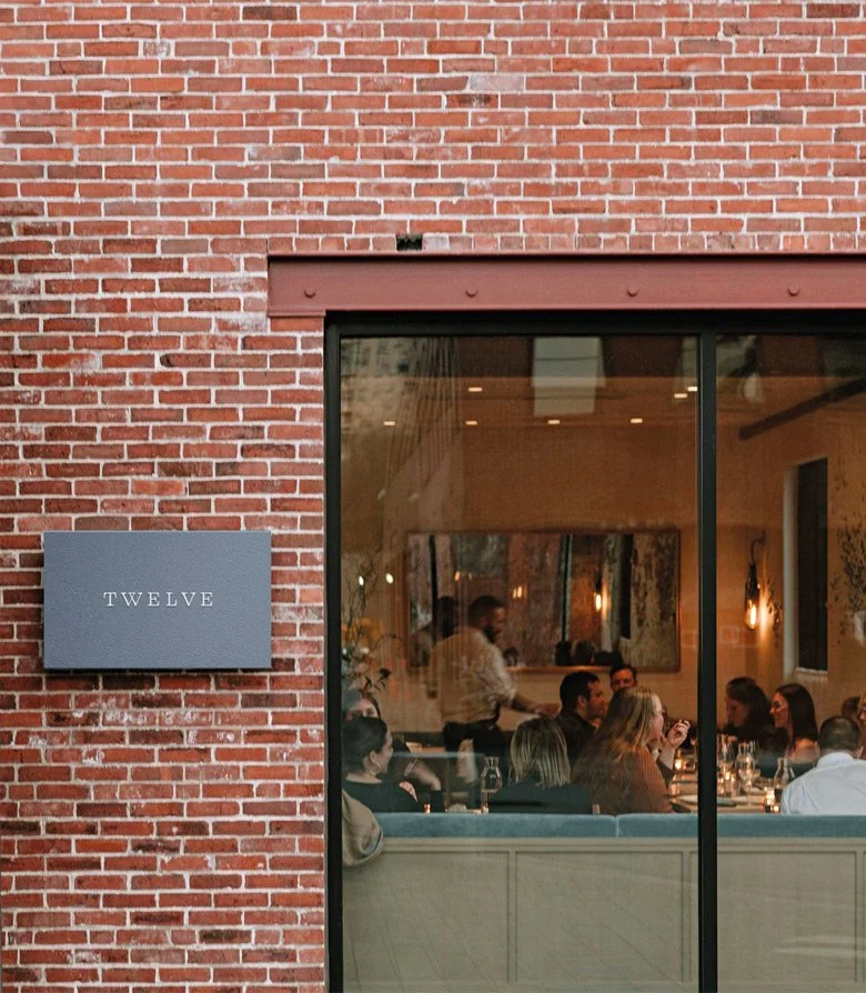 Exterior signage for Twelve, Maine. Part of the suite of collateral created featuring the new brand identity