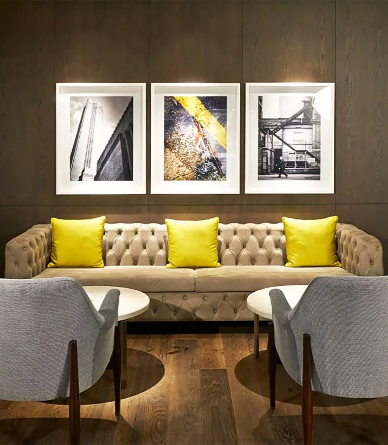 Photo of interior details featuring bright yellow pillows for Duke restaurant in Istanbul, taken as part of the brand identity by Colt