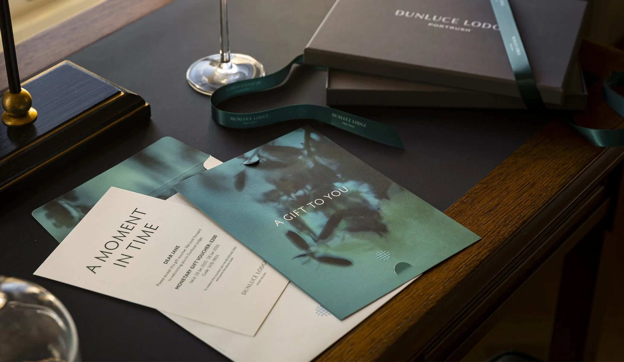 gift voucher and presentation box, part of the print collateral for Dunluce Lodge hotel branding by Colt