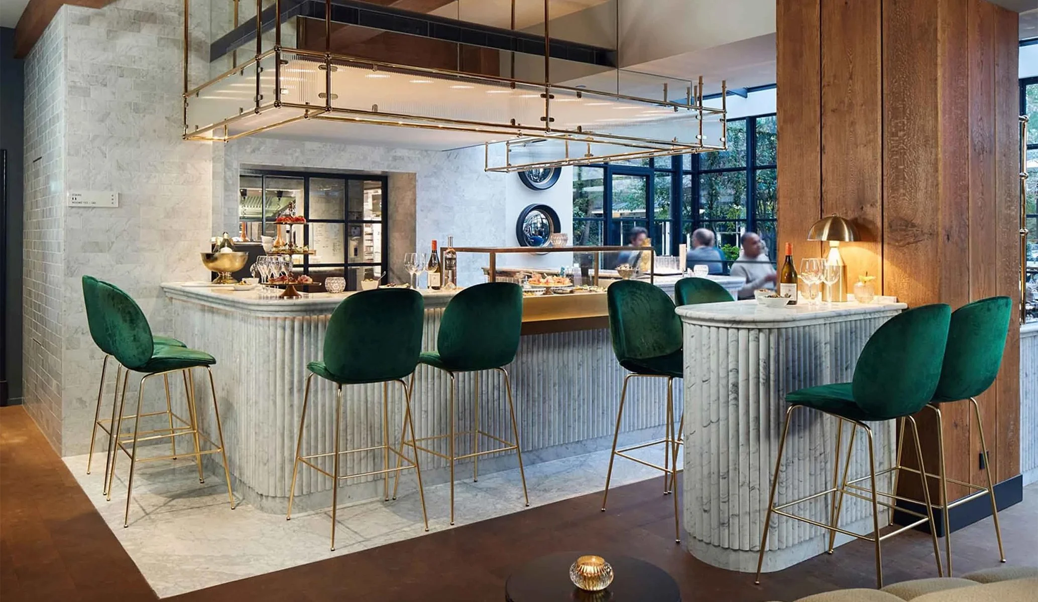 bar with green chairs at pulitzer garden restaurant at the pulitzer hotel, amsterdam