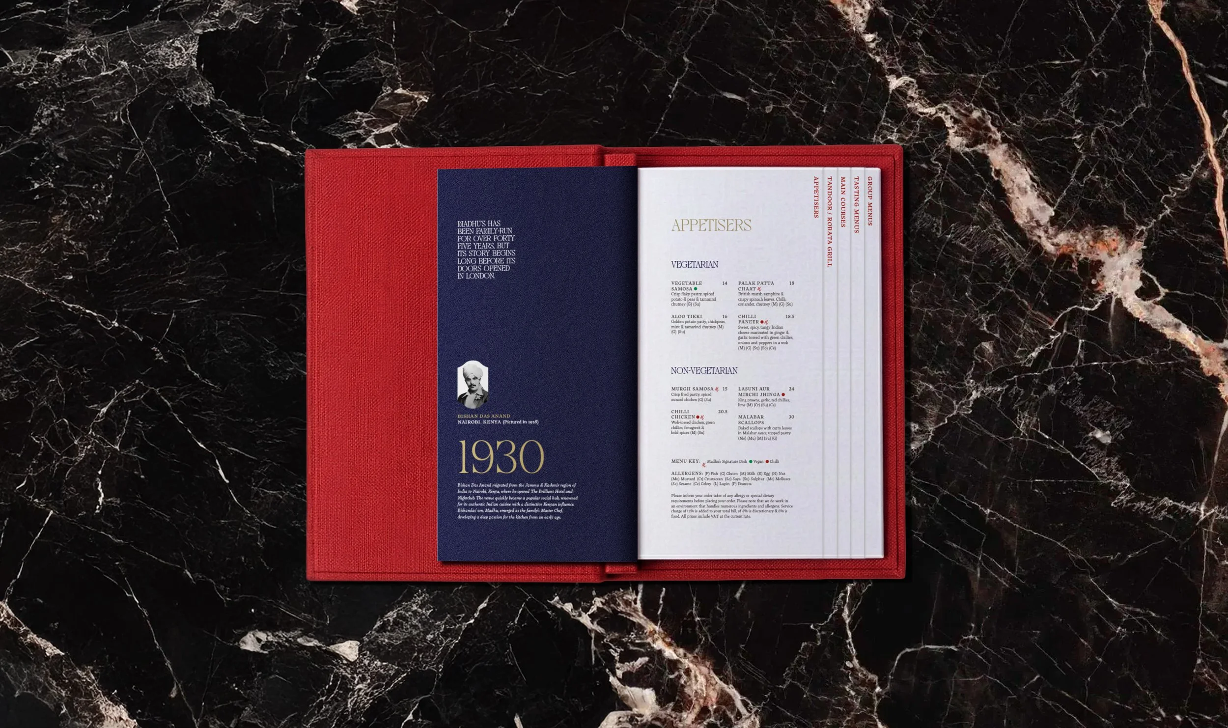 Open menu folder with tabs for Madhu's of Mayfair restaurant produced as part of the brand identity created by Colt
