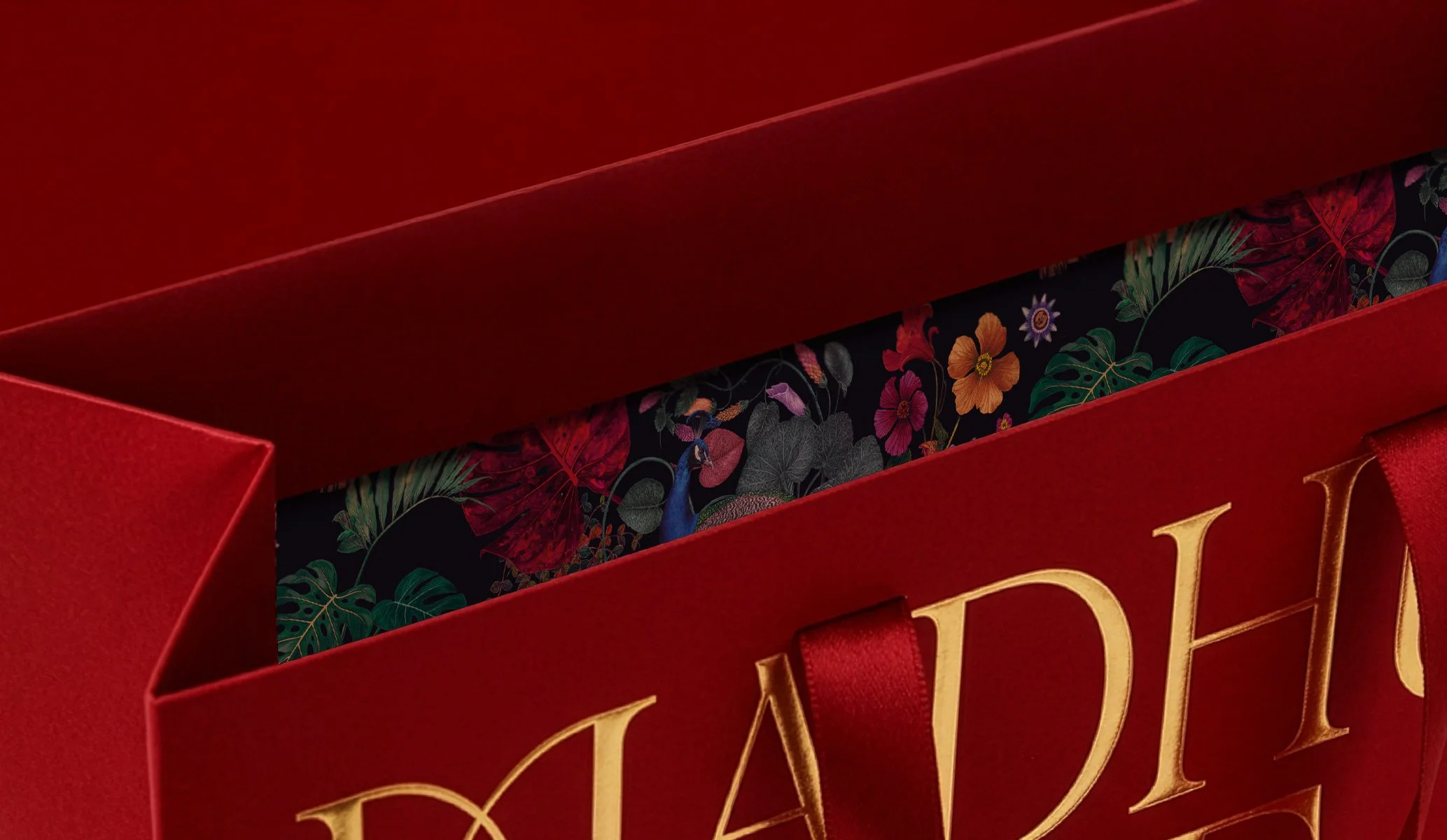 Luxury red paper bag close up showing interior illustration produced by Colt as part of the brand identity