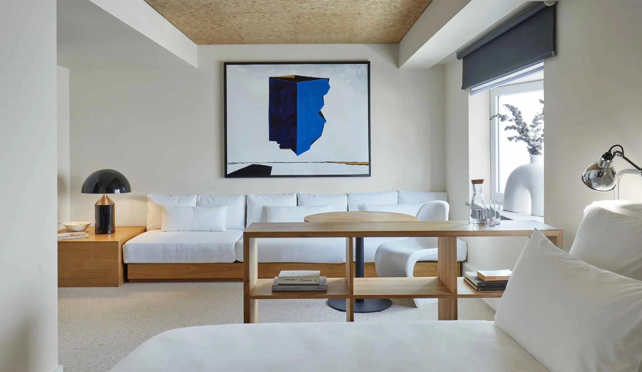 Room at One Hundred Shoreditch featuring large abstract canvas painting and minimalist aesthetic