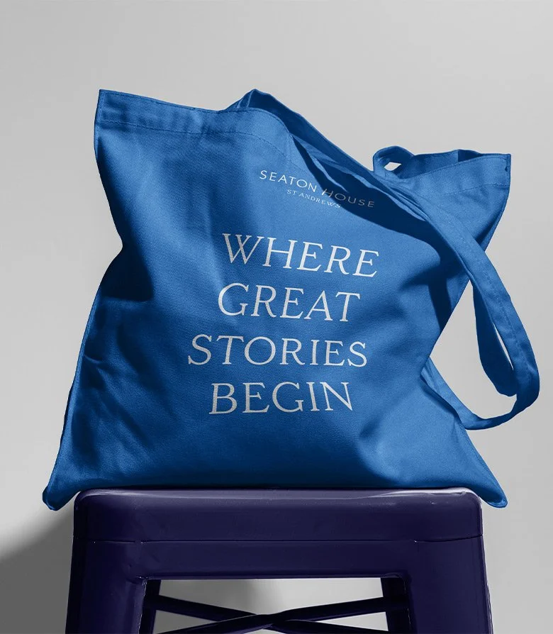 Blue, branded tote bag for Seaton House hotel created as part of the brand identity by Colt