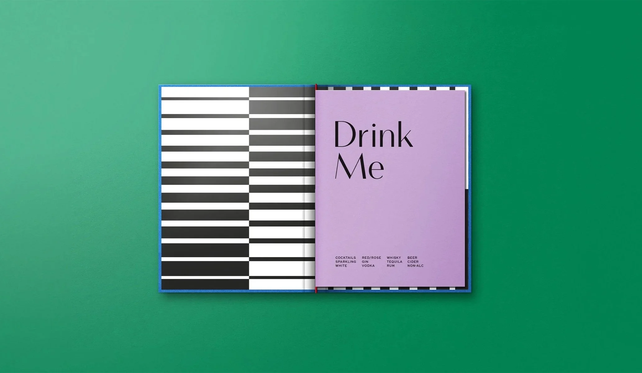 Open menu with striped inside cover and lilac first page featuring the words 'Drink Me'