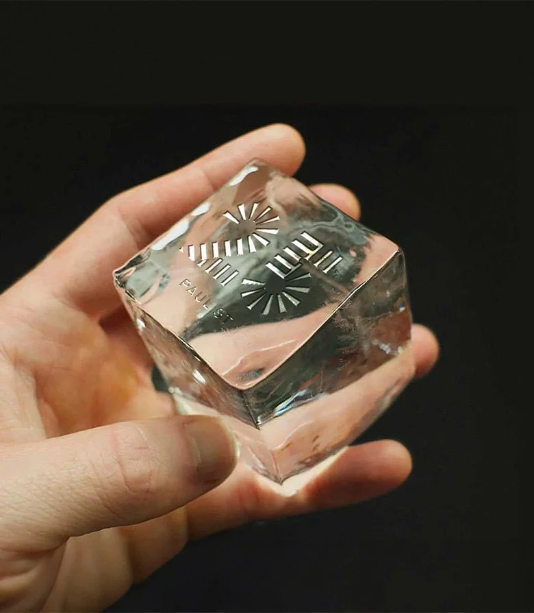 large ice cube featuring the logo for 25 Paul St, designed by Colt