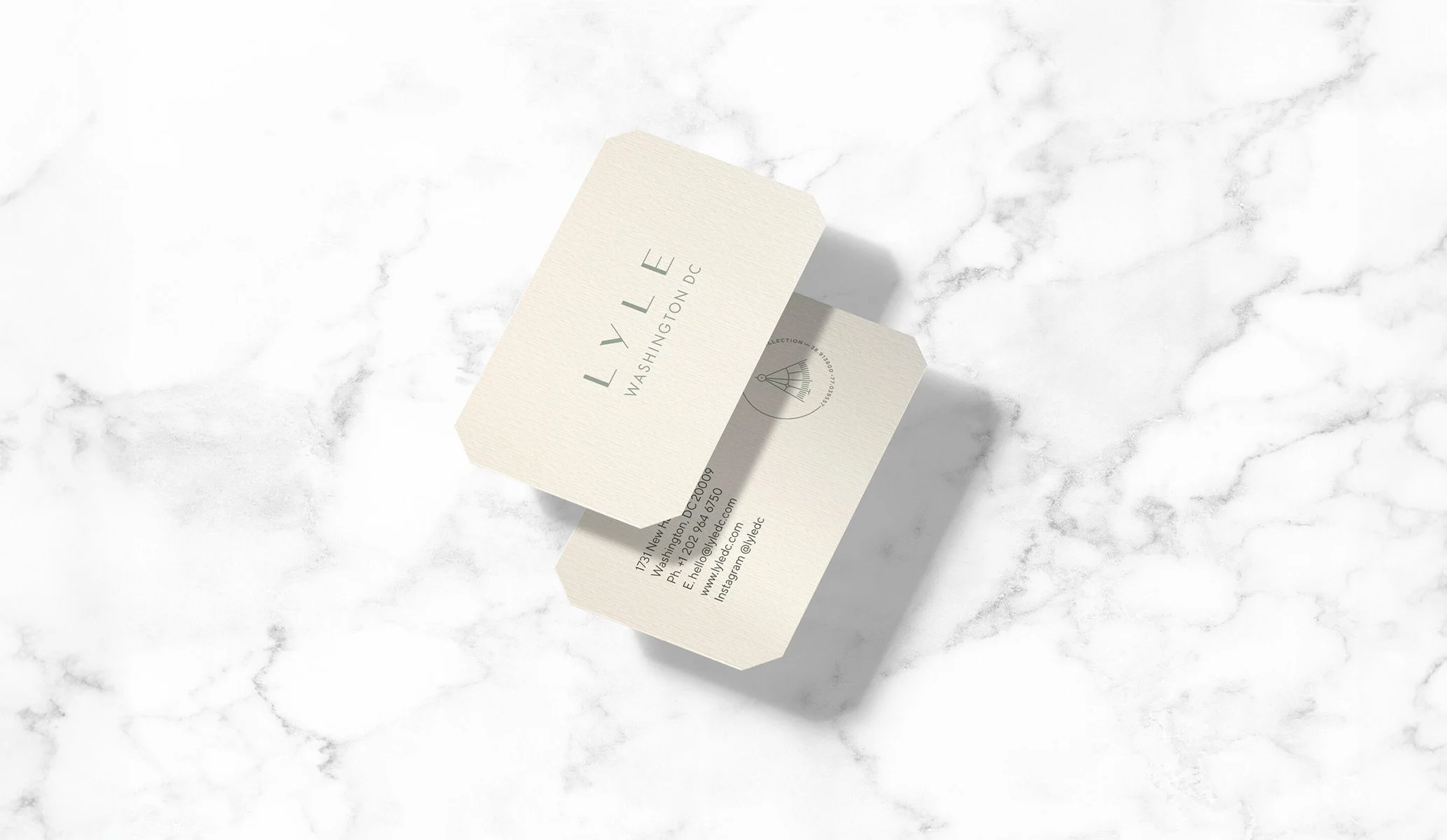 business cards on a marble background for Lyle Hotel in Washington DC, produced by Colt as part of the brand identity
