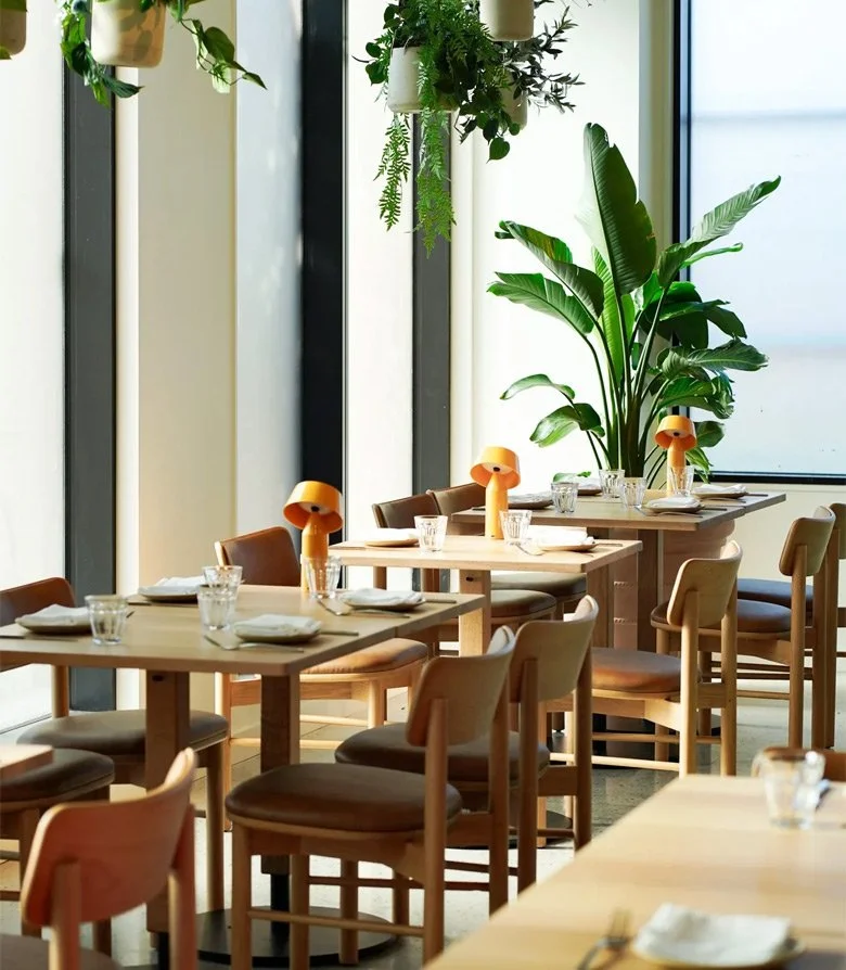 Interior photography of tables, chairs and lighting taken at Douro restaurant in Maine