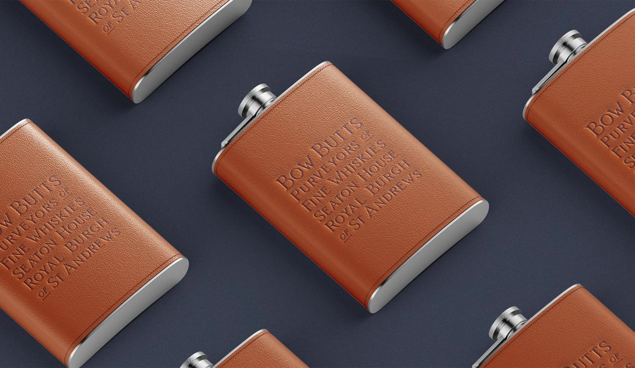 blind embossed whiskey flasks for Bow Butts bar at Seaton House
