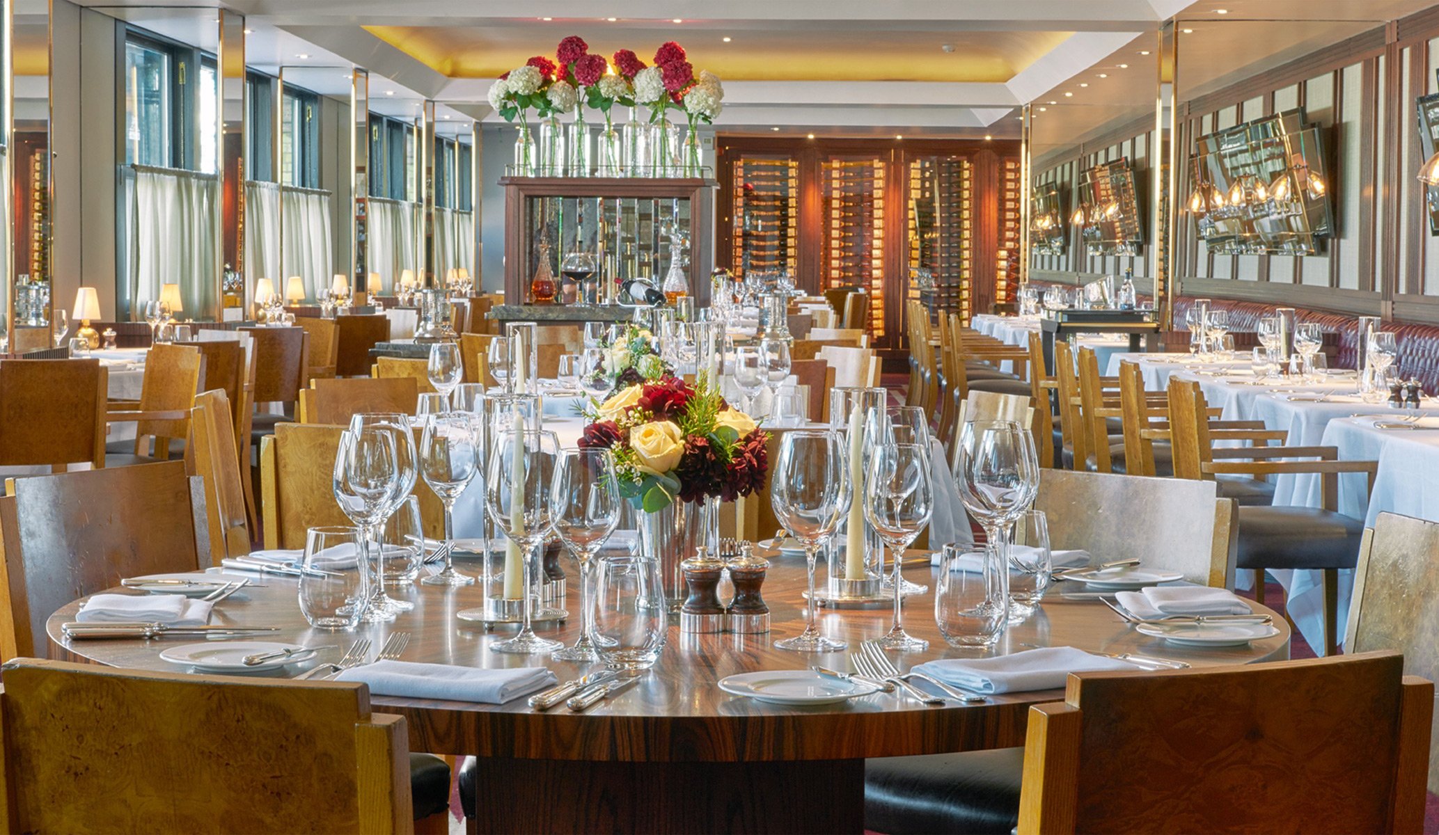 Table settings at Pont De La Tour in London with brand identity by Colt