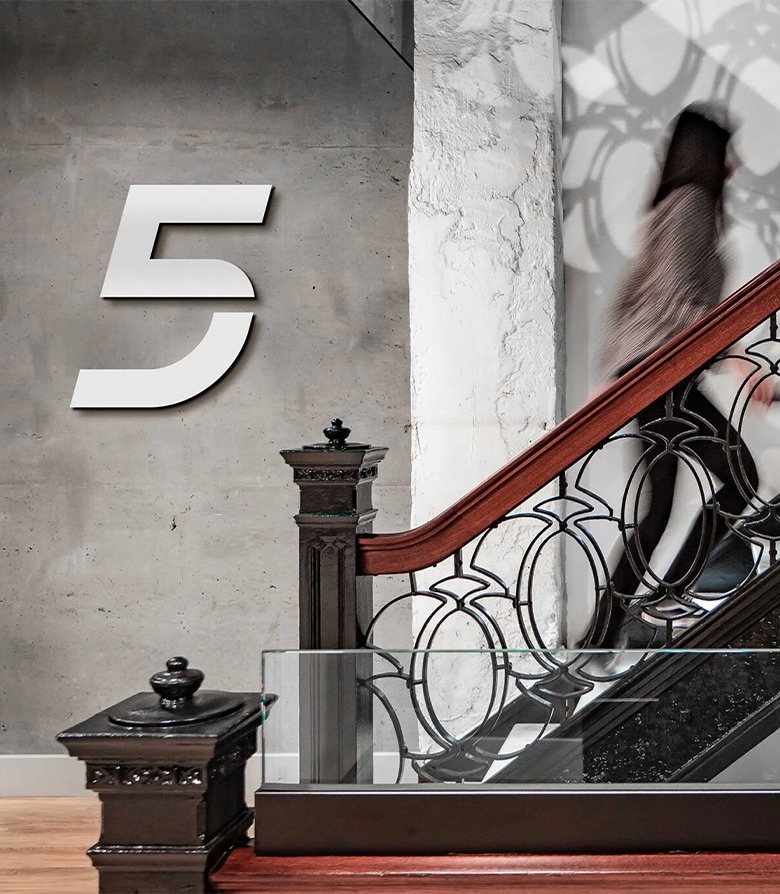 hotel wayfinding using Yotalic, a font created for the Yotel brand created by Colt, a specialist hotel branding agency in London