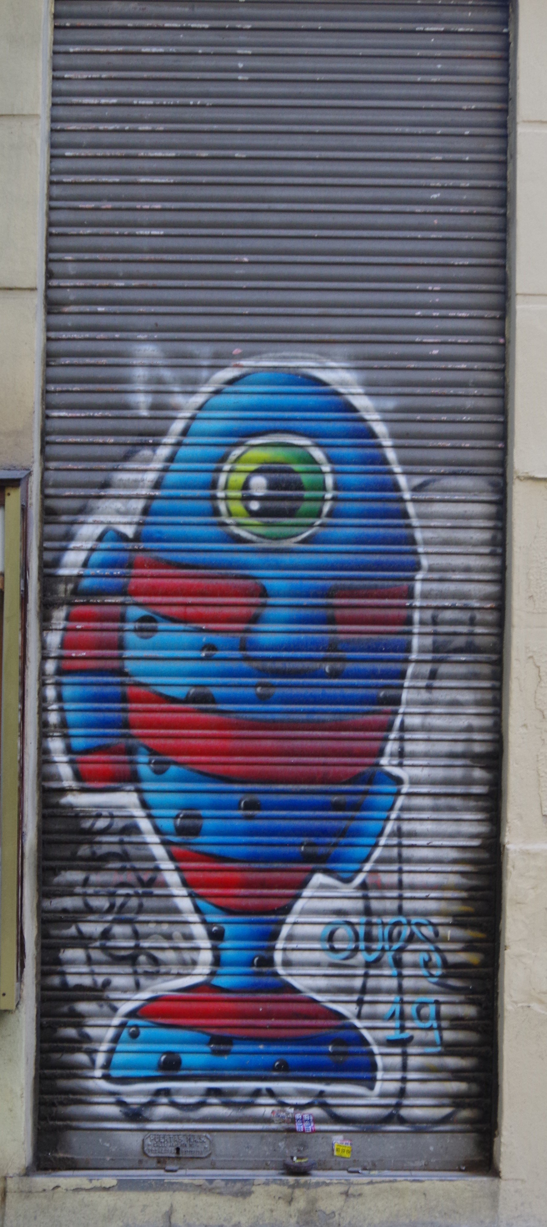  Door in Spain with graffitied fish 