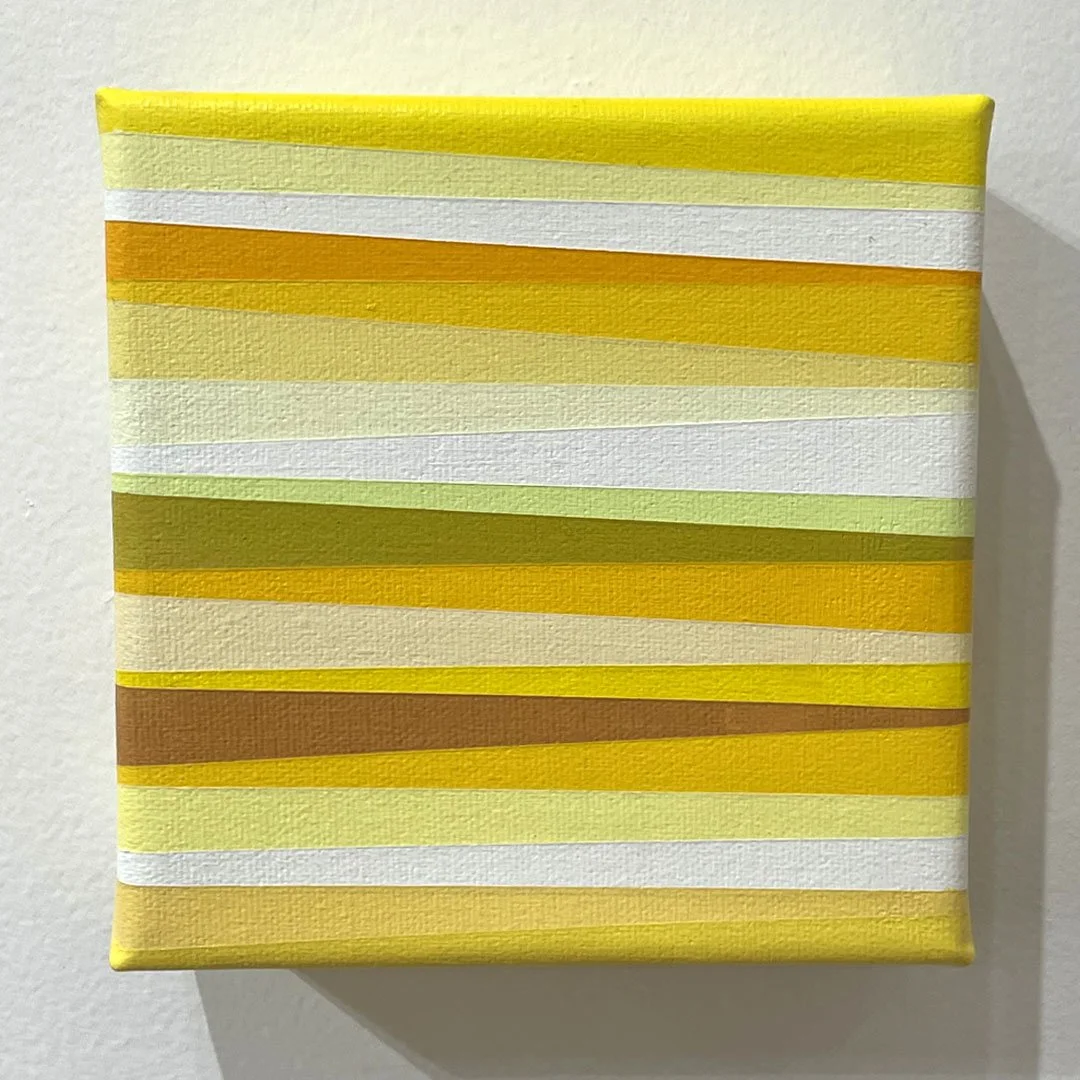 Abstract painting with layered diagonal yellow and white bands arranged in a horizontal pattern