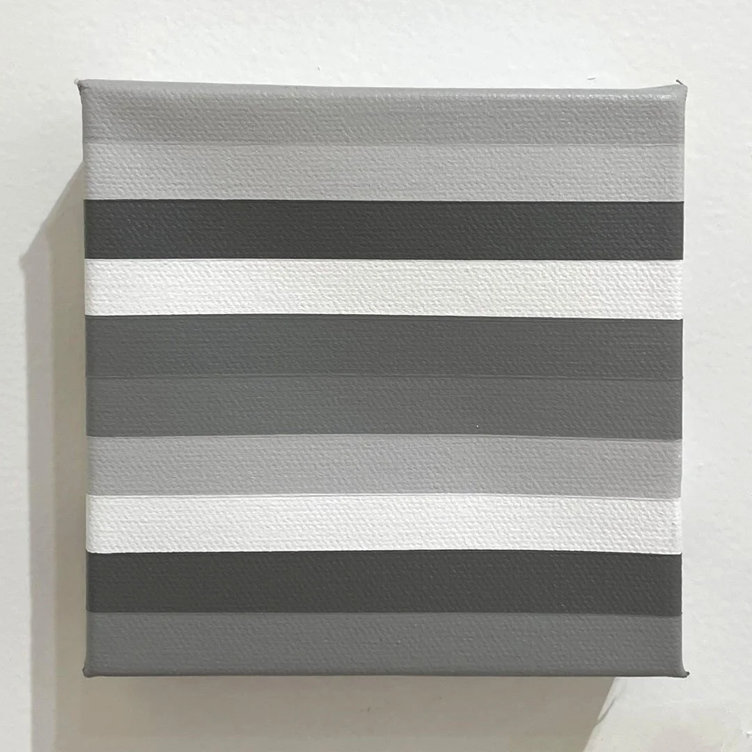 grayscale horizontal stripes in varying tones of grey, black, and white