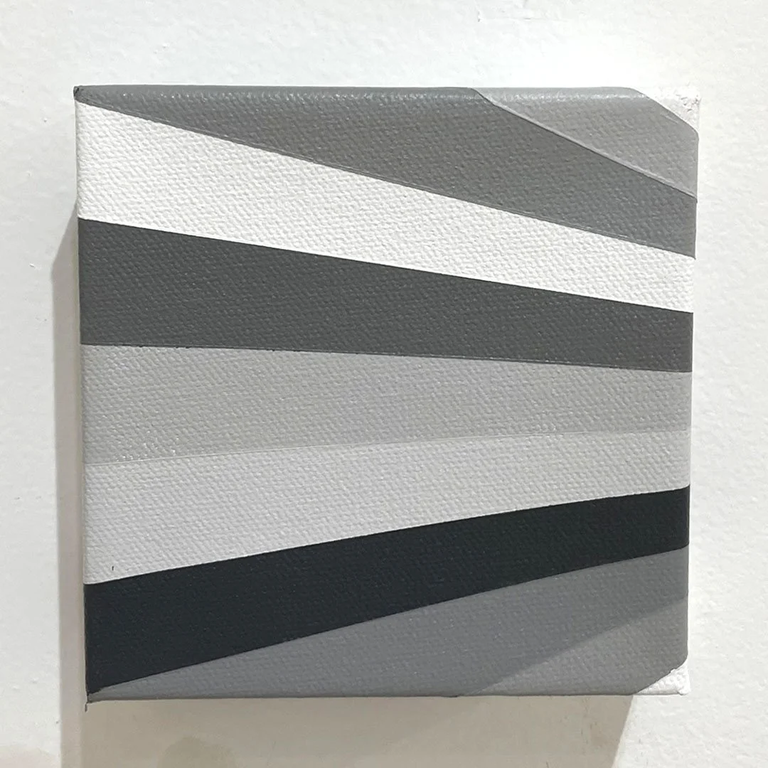 monochrome abstract painting with angled grey, black, and white bands