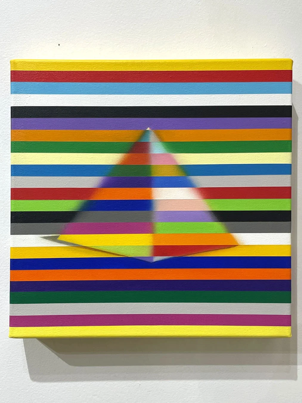 Abstract painting with horizontal multicoloured stripes creating a softly blended pyramid form