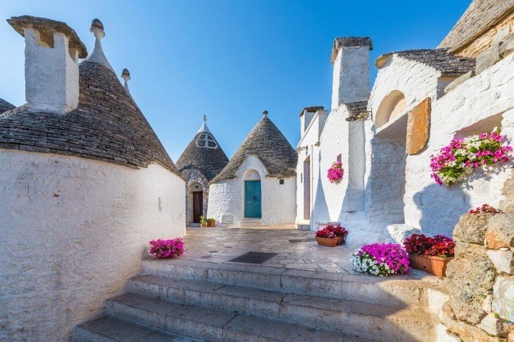 Like most sleepy towns in southern Italy, Alberobello&rsquo;s streets are narrow, the weather is warm, and the espresso has bite. But its higgledy-piggledy trulli with their dumpy shape and elf-hat roofs are like something from the world of Hans Chri