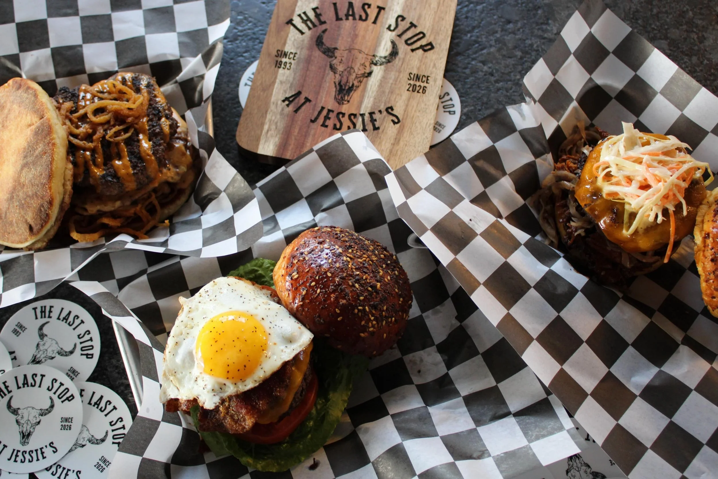 Put the chicken back in the freezer, unplug the slow cooker, abandon all meal prep dreams. It&rsquo;s National Burger Day at The Last Stop 🍔🔥

We&rsquo;re OPEN! Come celebrate with The Spudz Mackenzie, The Jessie&rsquo;s Burger, and the dangerously