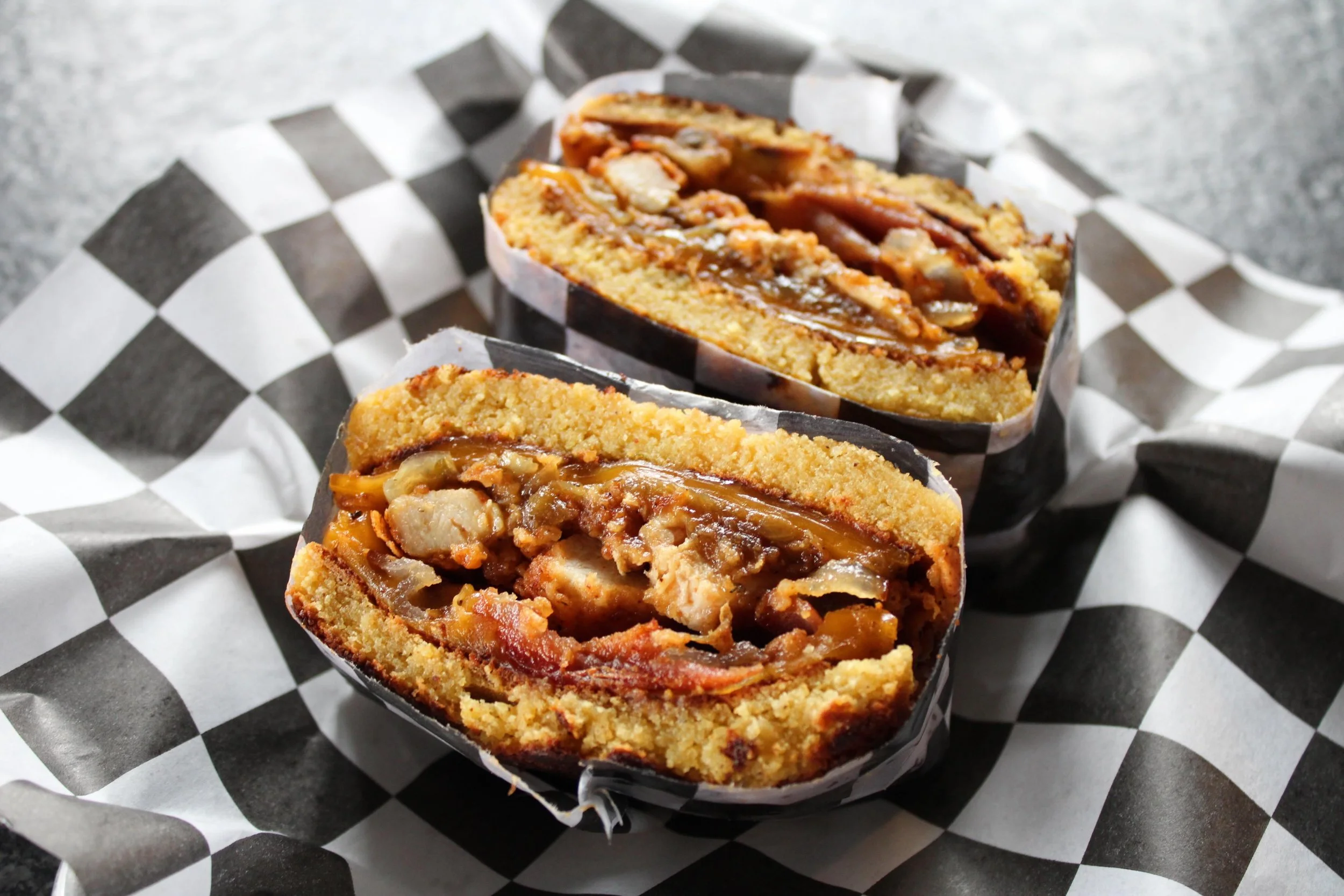 🔥 Meet the Southern Comfort 🔥

Sliced chicken, cheddar, bacon, caramelized onions, and steak sauce stacked between two thick slices of homemade jalape&ntilde;o cheddar cornbread.

Not your average grilled cheese.. come see what all the fuss is abou