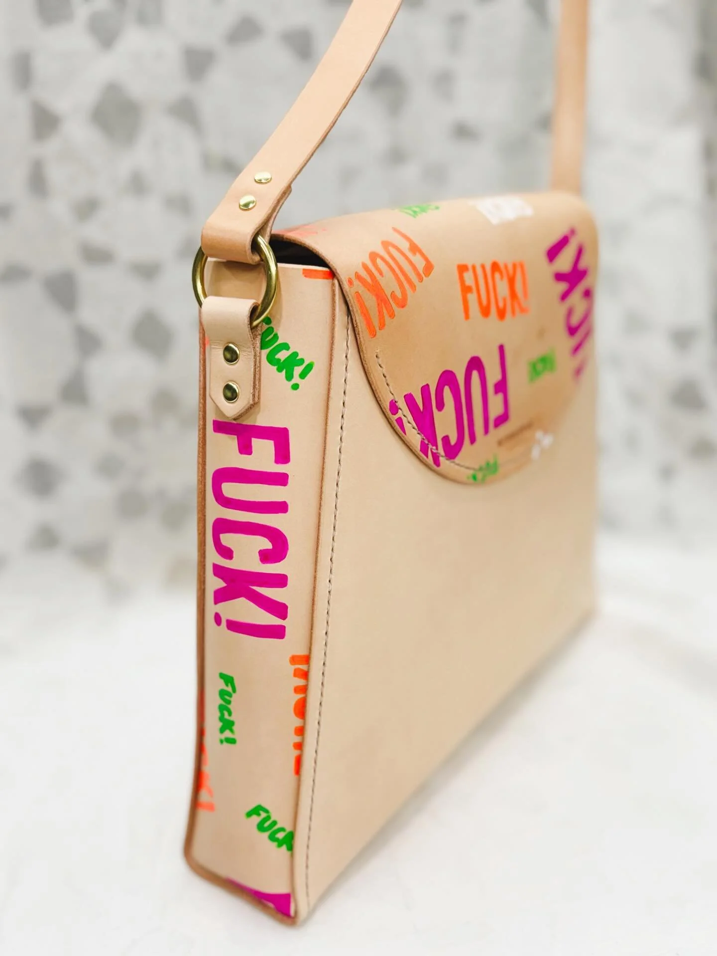 And for the lady(or gentleman or gentleperson), how about a second &ldquo;F*uck&rdquo; bag for those that want to be ✨a little✨ more subtle with their f*cks?

F*ck II Painted Dame in Natural
$350
Available online 4/3/26 @ 6pm
WWW.MIDDLEYAKLEATHERCO.C