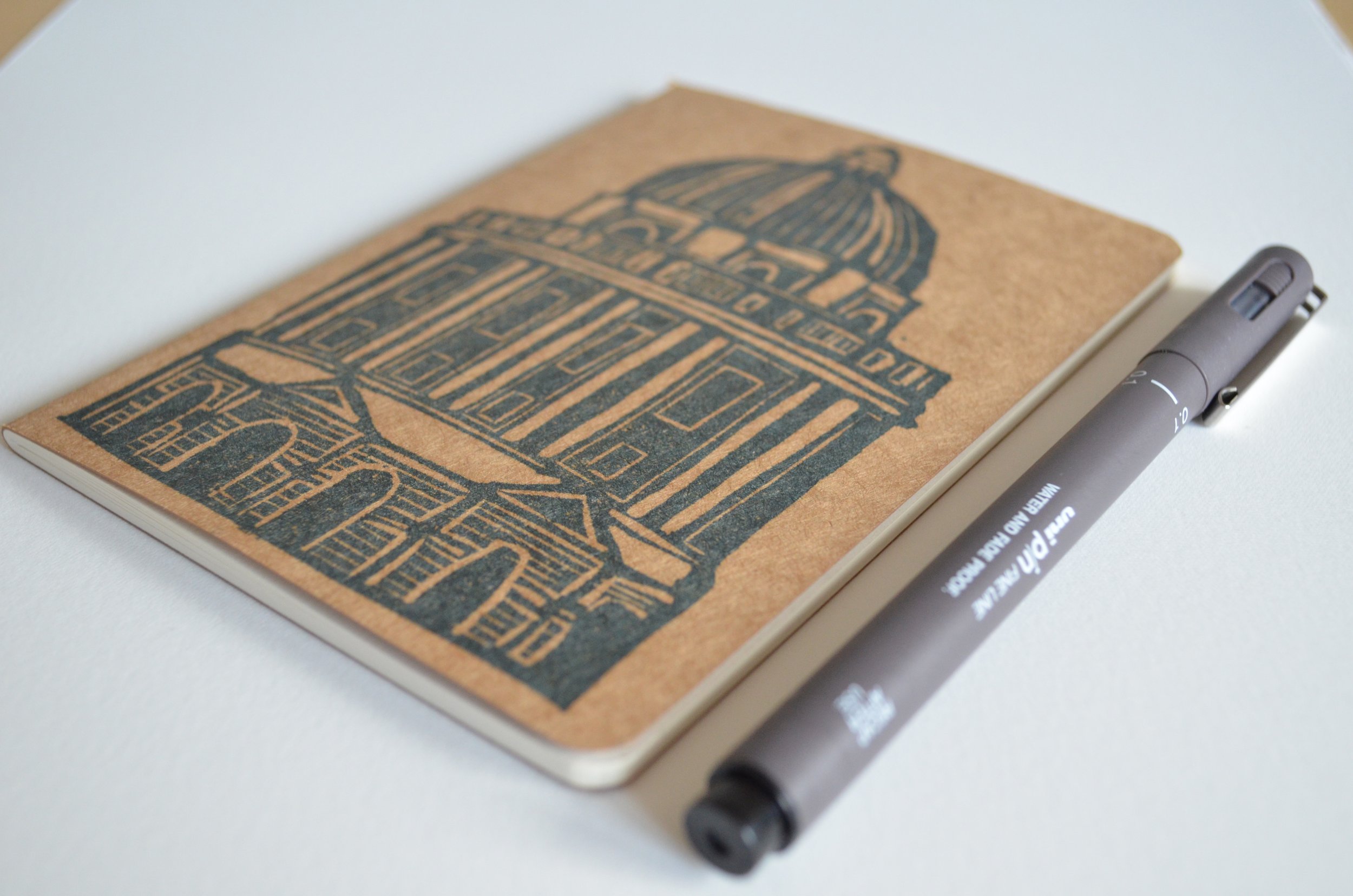 notebook with pen.jpg