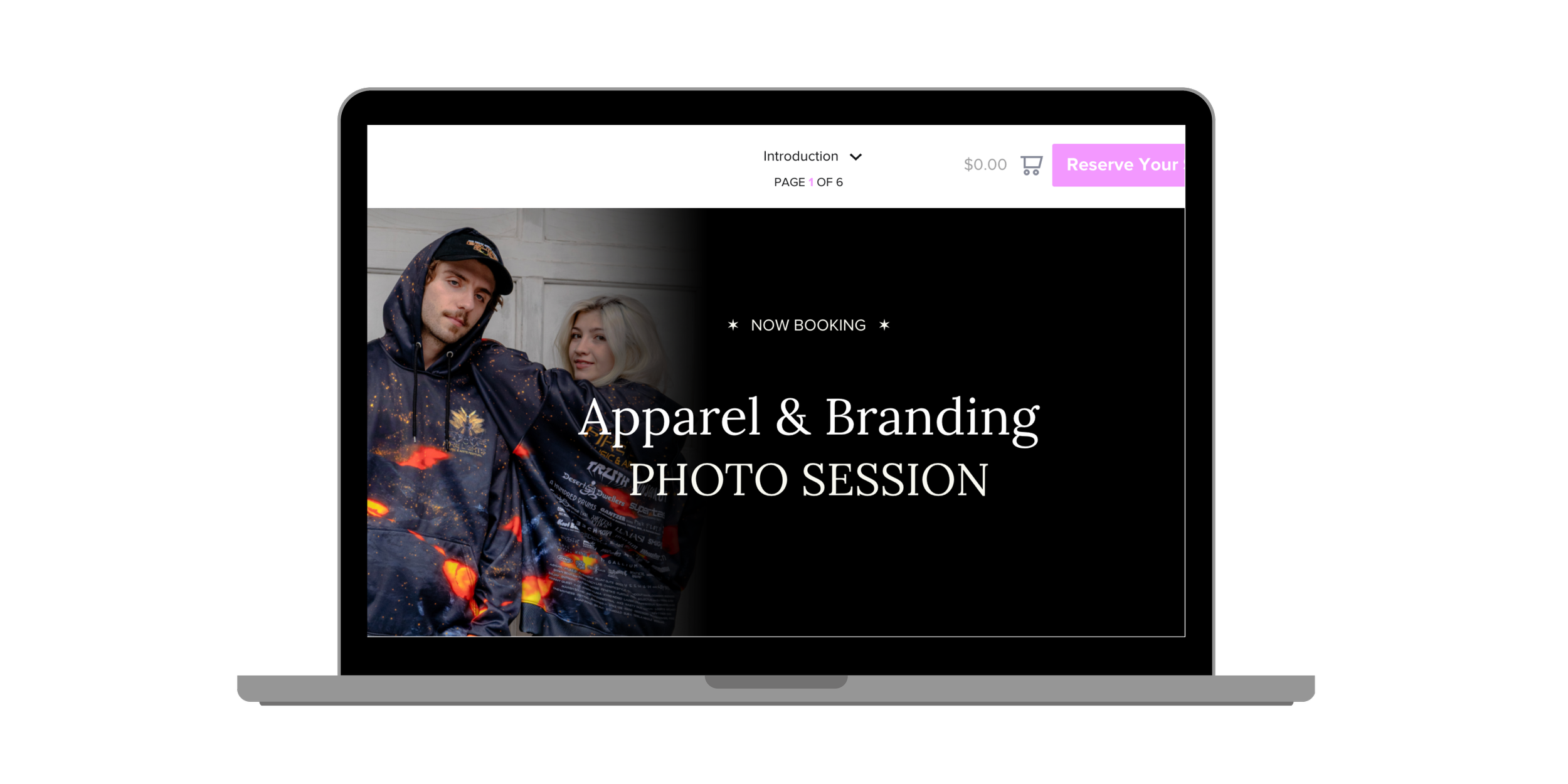 Laptop screen displaying an advertisement for Apparels & Branding Photo Session, with text indicating it is now booking and showing two models, one male and one female, in dark clothing with colorful patterns.