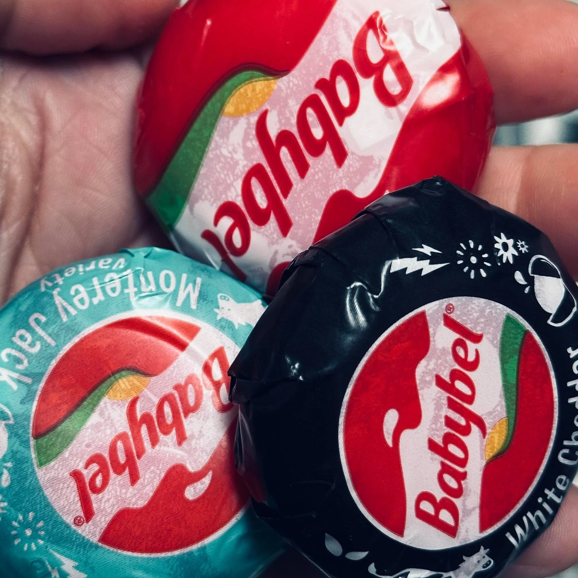 Why, Babybel, do you wrap the wax covering in plastic? It was already packaged.