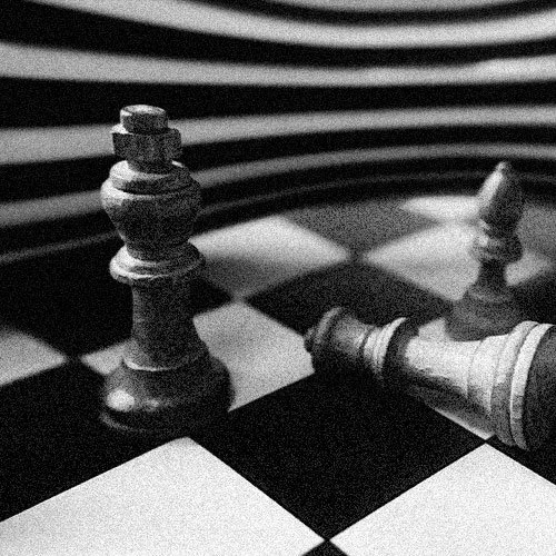 Black and white photo of a chessboard with two chess pieces, a king standing and a king lying down, and a background with horizontal lines.