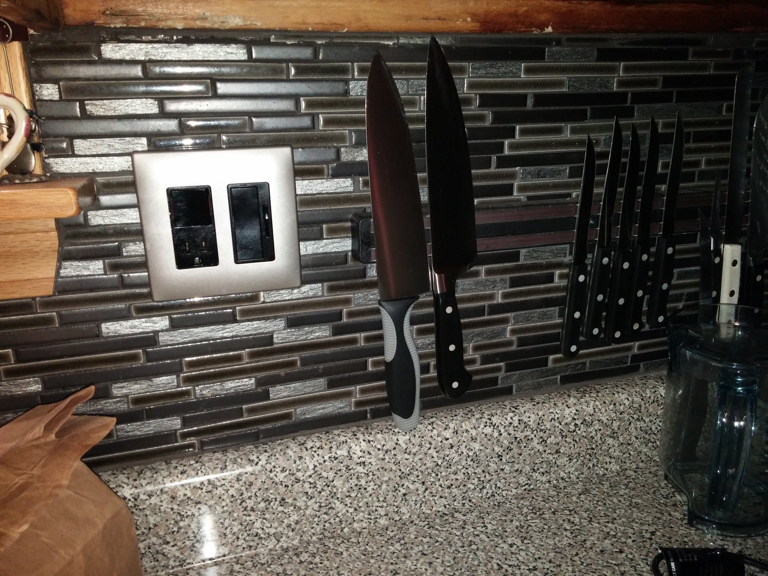 Mosaic backsplash with metallic accents
