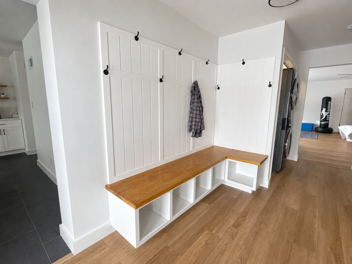 L-shaped entry bench with cubbies-1.png