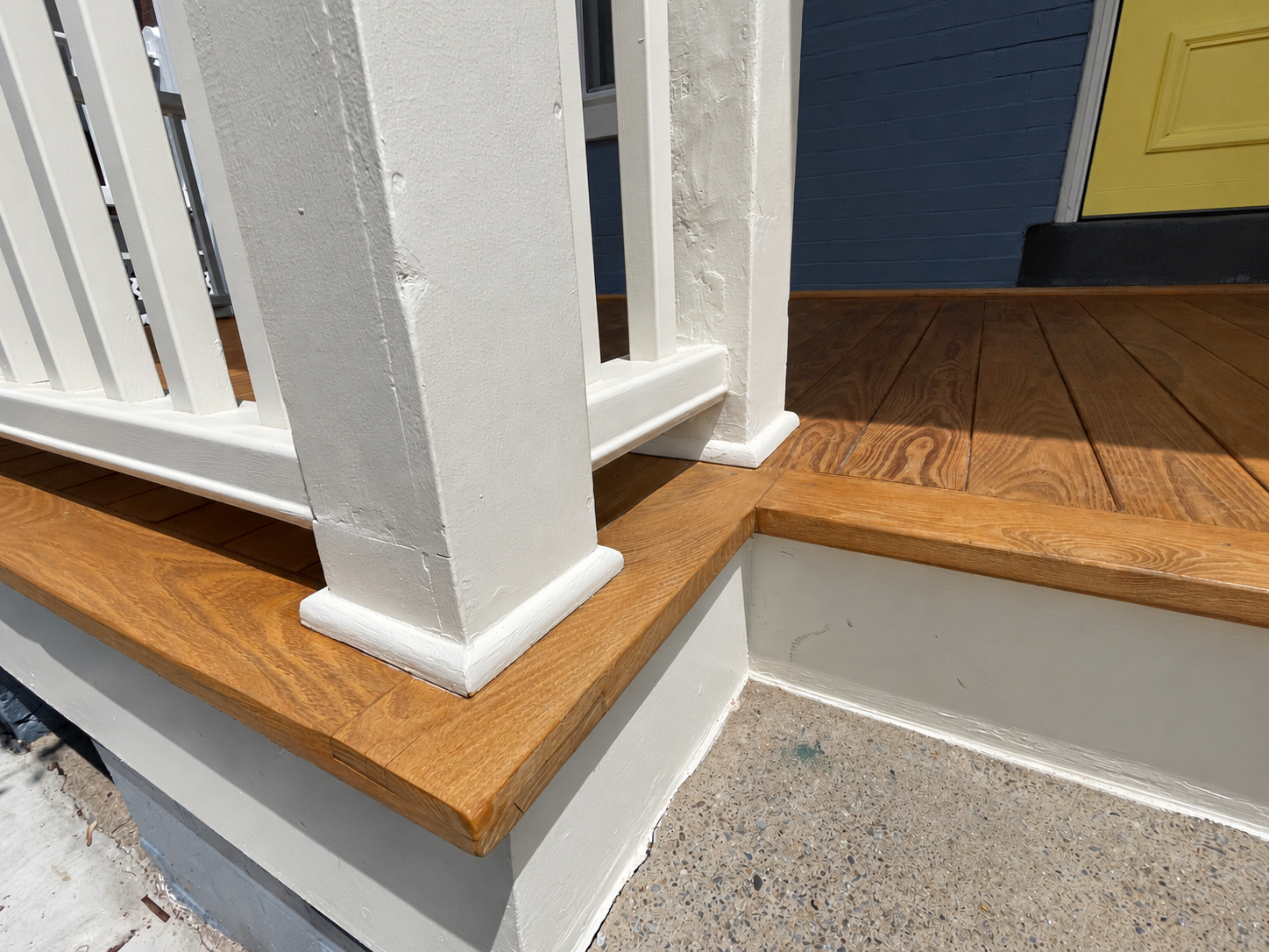 Golden timber floor with painted railings-1.png