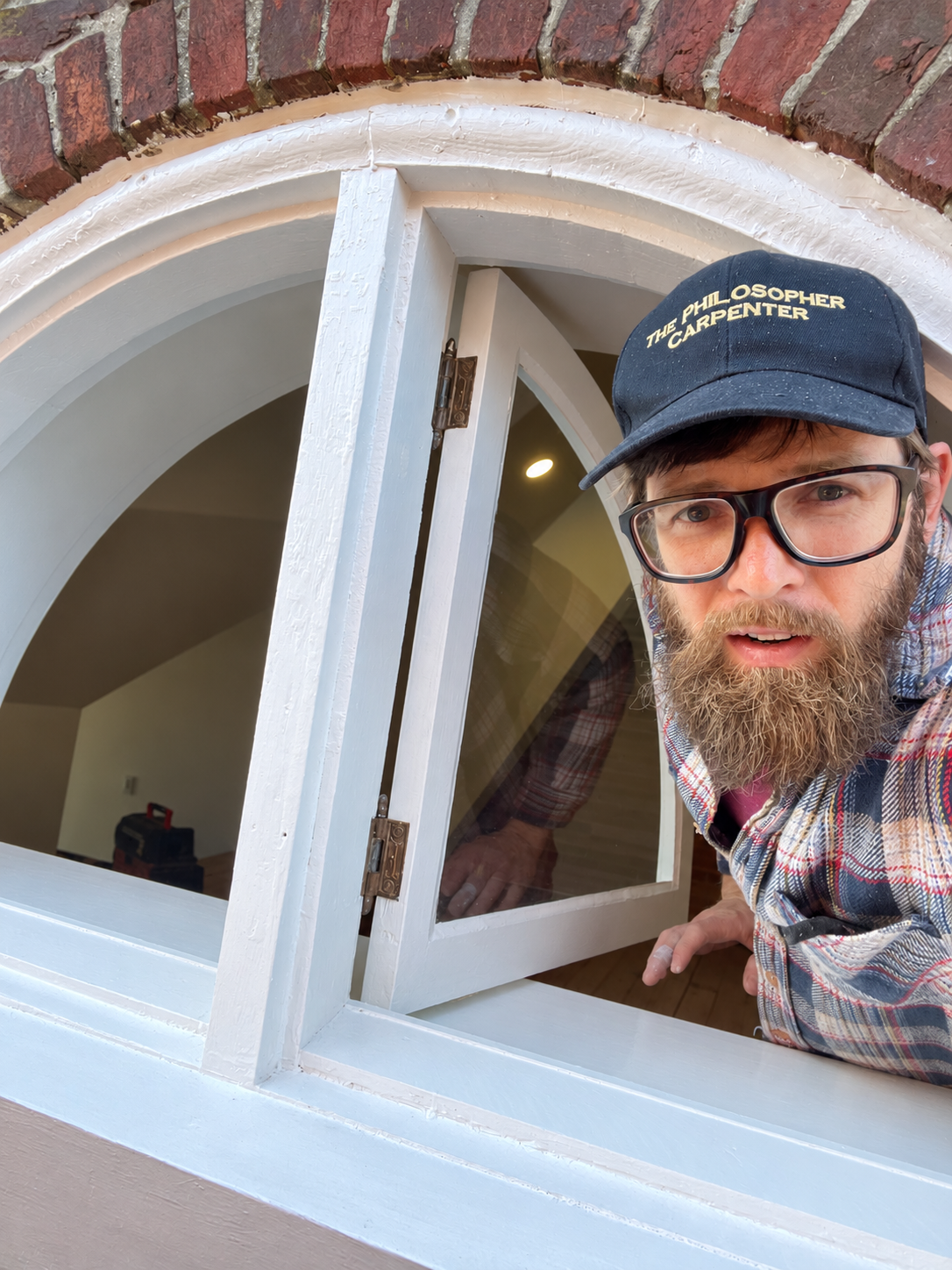 Carpenter portrait by an arched window-8.png