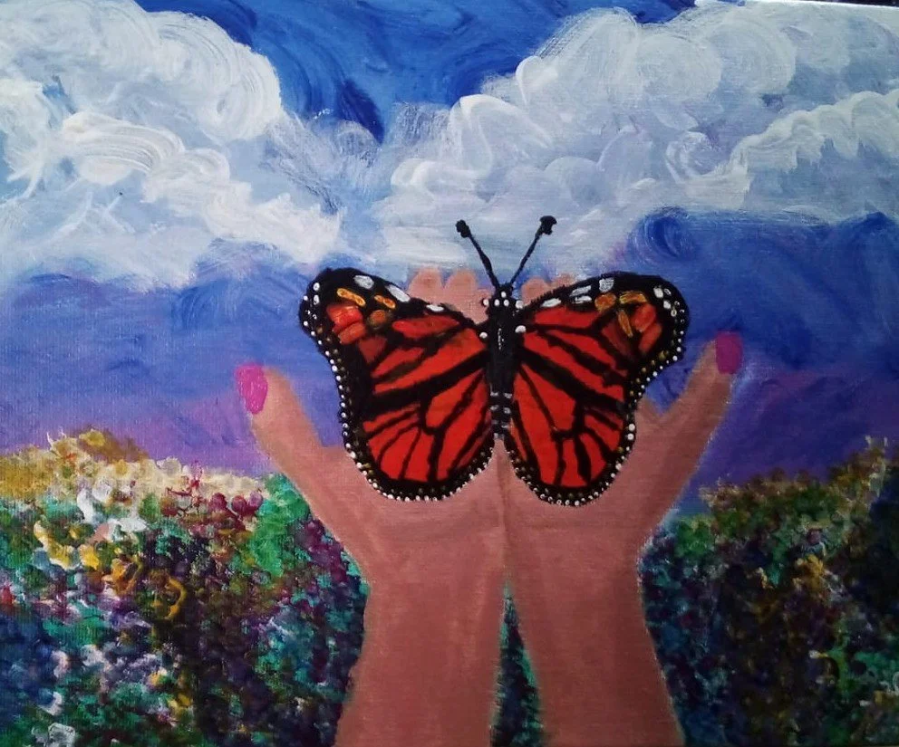 A painting of hands raised towards the sky with a monarch butterfly perched on the middle fingers, against a background of clouds and colorful foliage.